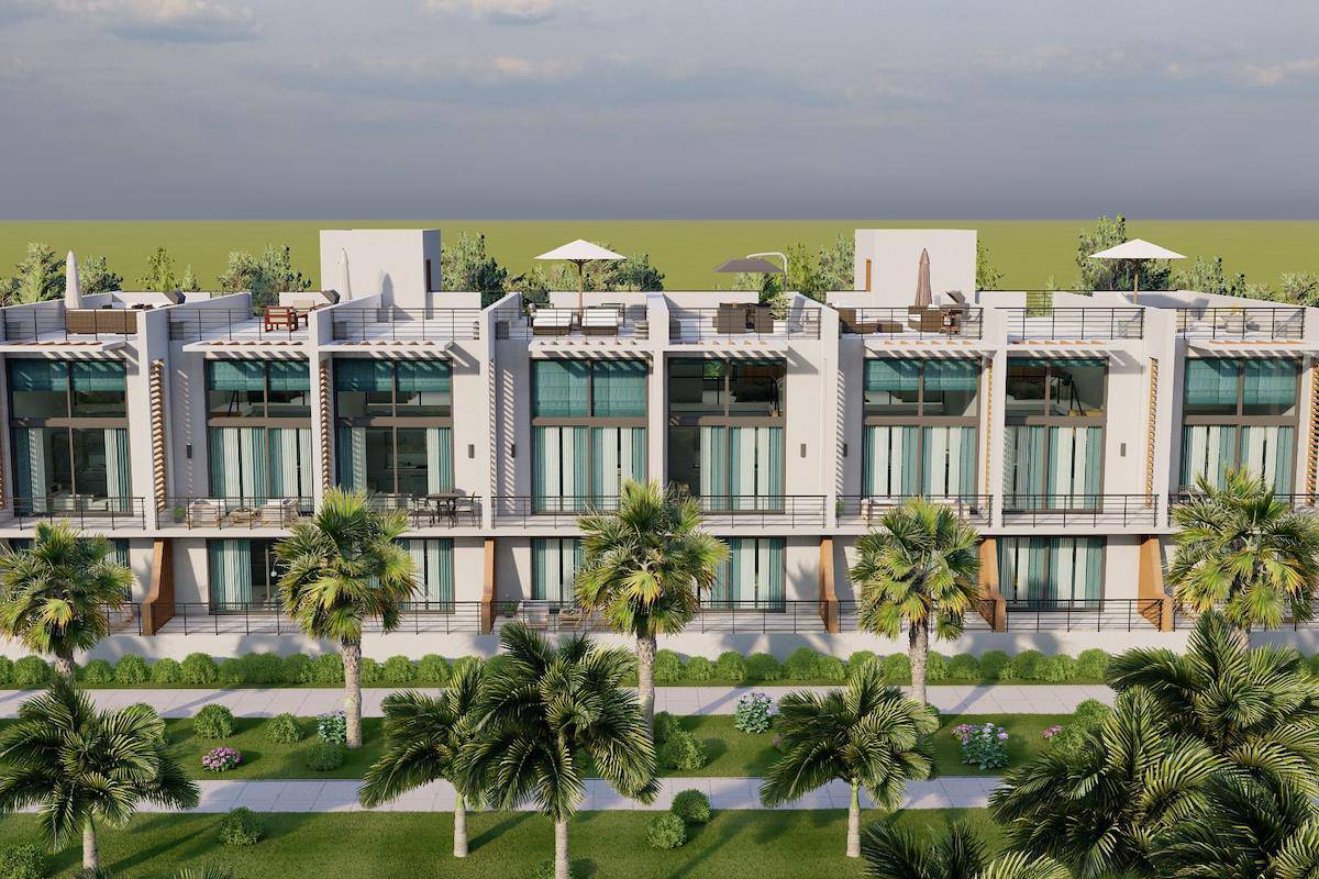 Front view of a modern villa at dusk